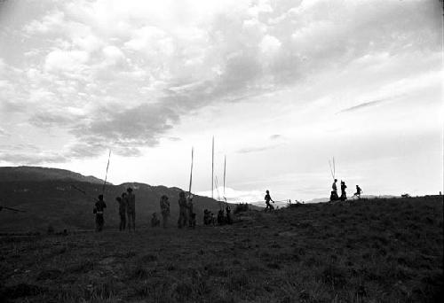 men leaving the Warabara to go home