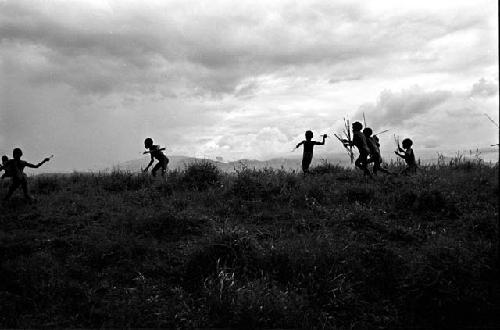 Boys playing war games