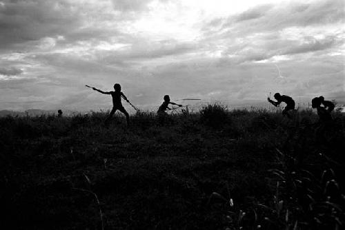 Boys playing war games