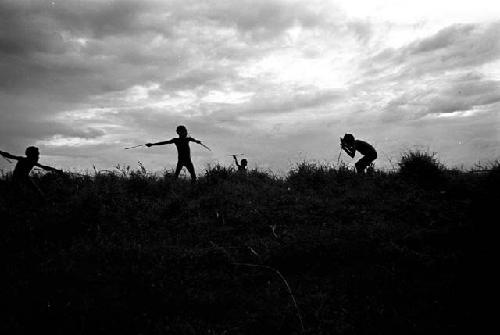 Boys playing war games