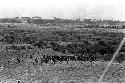 Men leaving a war on the Warabara; going through the marsh