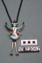 Knifewing bolo tie with multi-stone channelwork