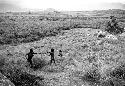 Children playing on the Anelerak; Siobara visible in the distance