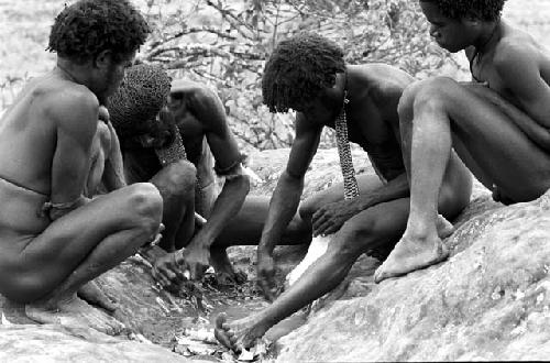 Tekman Biok and other men working on mikak on the Anelerak