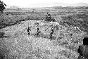 Three boys running on the Anelerak; view towards the Siobara