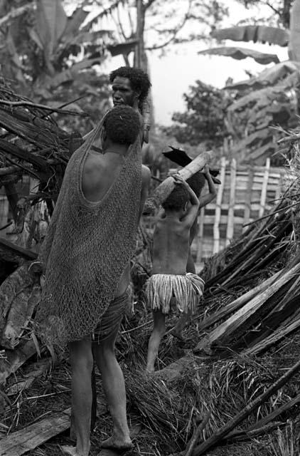 Tearing apart an old hunu in Abukulmo