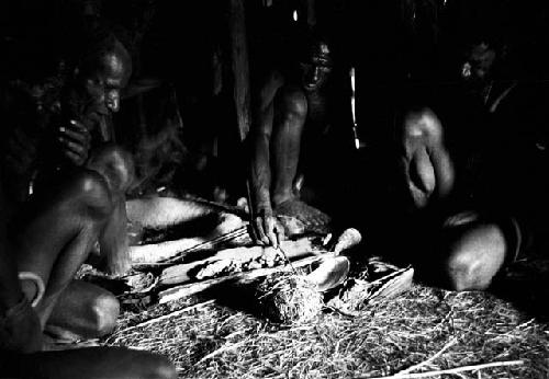 Men sitting and smoking