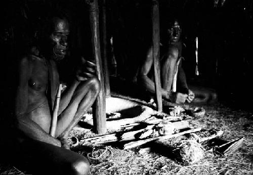 Men sitting and smoking