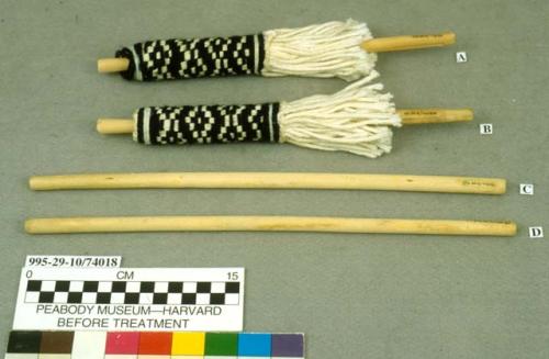 Pair of corn tassels (A & B) and pair of wooden dowels (C & D)