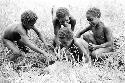 Children playing together:  Aplekma, Uwar and 2 others