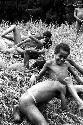 Children playing in the grass near Homoak