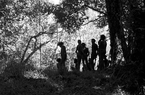 Men waiting to go to an Etai