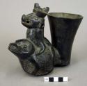 Zoomorphic black pottery vessel
