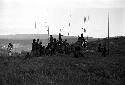 Robert Gardner filming a group of warriors on the Warabara