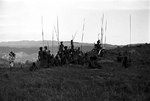 Robert Gardner filming a group of warriors on the Warabara