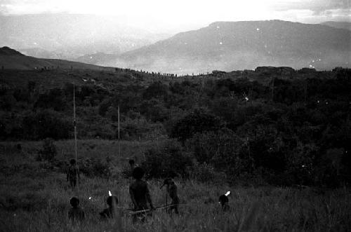 Warriors watch a distant battle on the Warabara