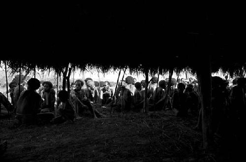 Men under an oléa on the Liberek