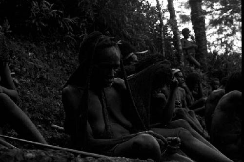 People sitting in the forest