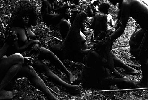 People greeting in the forest