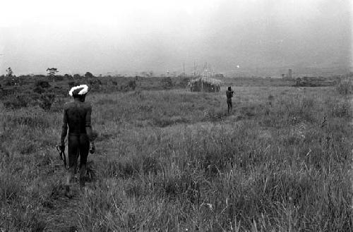 Asuk walking towards the Tokolik