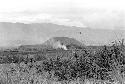 View of a distant fire, from a garden in Alima