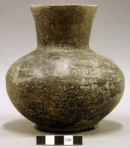 Ceramic vessel, medium flared neck, platform base with punctate design