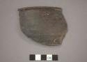 Ceramic rim sherd of bowl, lipped rim