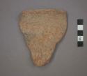 Ceramic rim sherd of jar?, course exterior surface