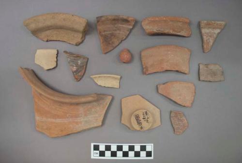 Rim and base sherds and one miniature jar, some sherds have painted designs