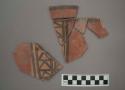 Ceramic body and rim sherds of bowl?, red and black designs on exterior