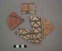 Ceramic body and rim sherds of bowl?, red and black designs on exterior