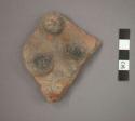 Ceramic body sherd with four rounded knob-like features