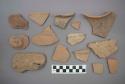 Ceramic sherds, many with course surface, some with painted designs