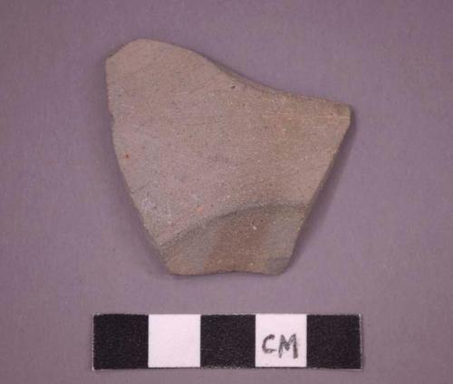 Ceramic base sherd, smooth surface texture