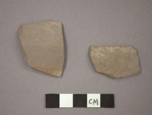 Ceramic body sherds, red pigment? on gray exterior