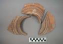 Ceramic flared rim and body sherds, three black parallel bands on shoulder, will mend together