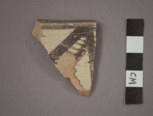 Ceramic rim sherd of bowl?, black designs on buff on exterior