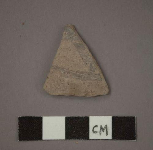 Ceramic sherd, black painted designs on exterior