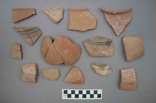 Ceramic rim or body sherds, plain or course or some with painted designs, some mended