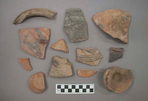 Ceramic sherds, plain or course or with painted designs, some burnished, some mended