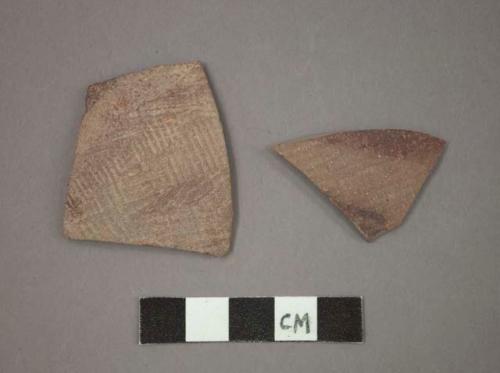 Ceramic body sherds, incised texture and red painted designs on exterior