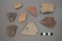 Ceramic body or rim sherds, several with painted designs