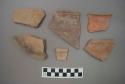 Ceramic rim sherds and one plate? sherd, some sherds have pigment