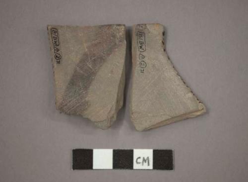 Ceramic base sherds, black painted designs on interior, incised designs on exterior, will mend together