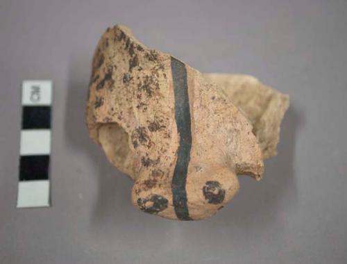 Clay fragment of (eagle?) head