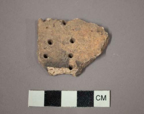 Sherd with small holes