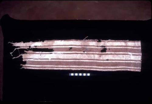 Textile fragment with brown stripes from Site 19