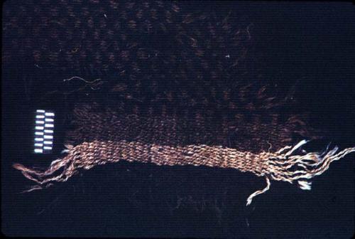 Wool textile fragment with stripes from Site 19