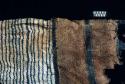 Textile fragment with thin blue stripes from Site 120