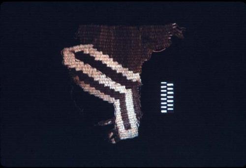 Textile fragment with brown and white diagonals from Site 131